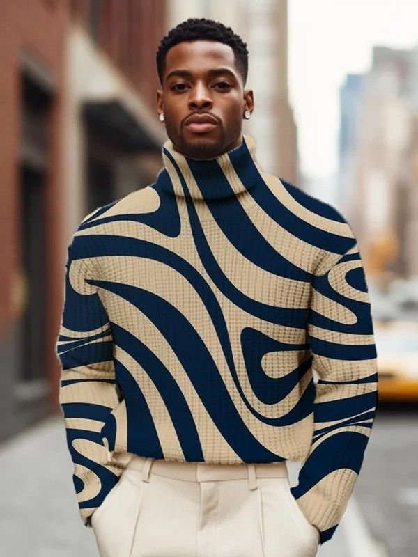 Portrait of a man in a bold navy-and-cream swirl-print turtleneck sweater on a city street